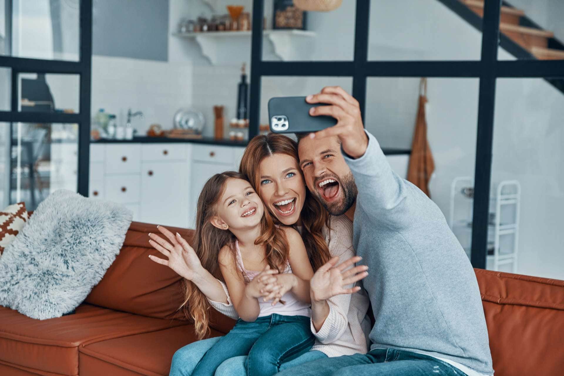 Happy family taking selfie